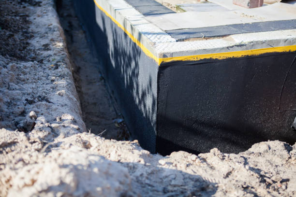 Professional Exterior Waterproofing technician working in Rossville, KS